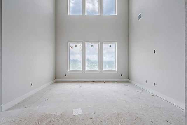 177 Peninsula Point Dr, Montgomery, TX 77356 - unfurnished room featuring a towering ceiling