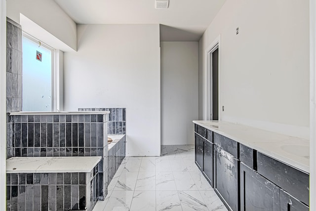 177 Peninsula Point Dr, Montgomery, TX 77356 - bathroom with marble finish floors and a bath