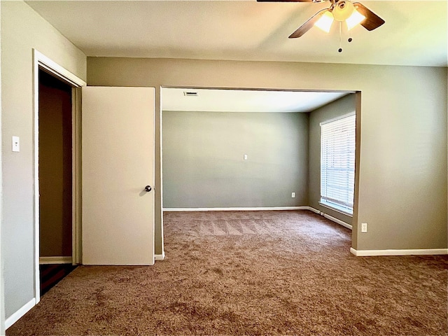 8322 Cabot St, Houston, TX 77078 - spare room featuring carpet flooring, ceiling fan, and baseboards