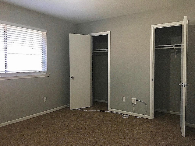 8322 Cabot St, Houston, TX 77078 - unfurnished bedroom featuring two closets