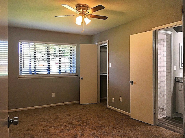 8322 Cabot St, Houston, TX 77078 - unfurnished bedroom featuring carpet floors, a ceiling fan, ensuite bath, and baseboards