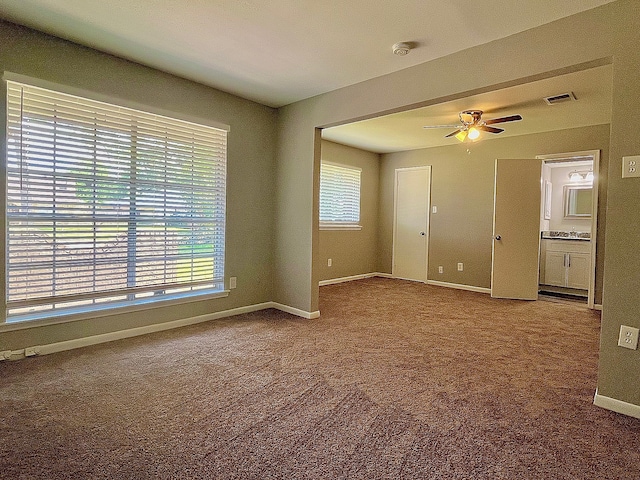8322 Cabot St, Houston, TX 77078 - carpeted empty room with a ceiling fan, baseboards, and a smoke detector