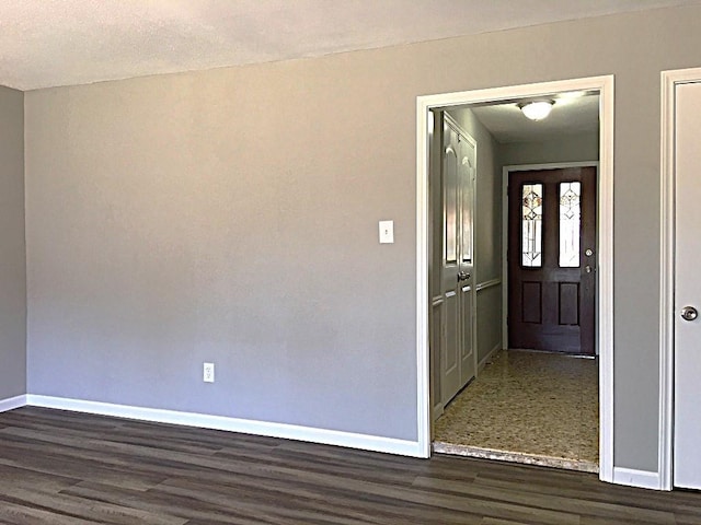 8322 Cabot St, Houston, TX 77078 - entrance foyer with baseboards and dark wood-style flooring