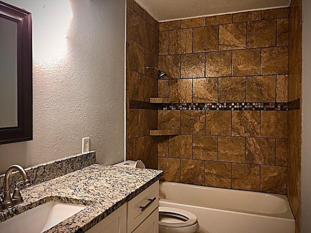 8322 Cabot St, Houston, TX 77078 - bathroom with toilet, vanity,  shower combination, and a textured wall