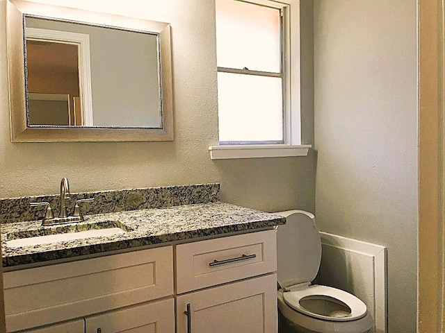 8322 Cabot St, Houston, TX 77078 - bathroom with toilet and vanity