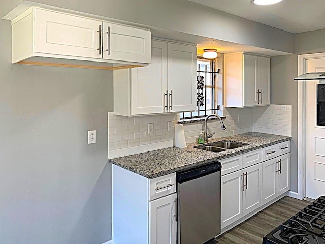 8322 Cabot St, Houston, TX 77078 - kitchen featuring stainless steel dishwasher, a sink, dark stone counters, and decorative backsplash