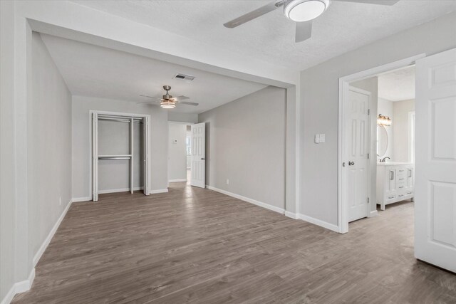 3518 Ball, Galveston, TX 77550 - spare room with ceiling fan, wood finished floors, and baseboards