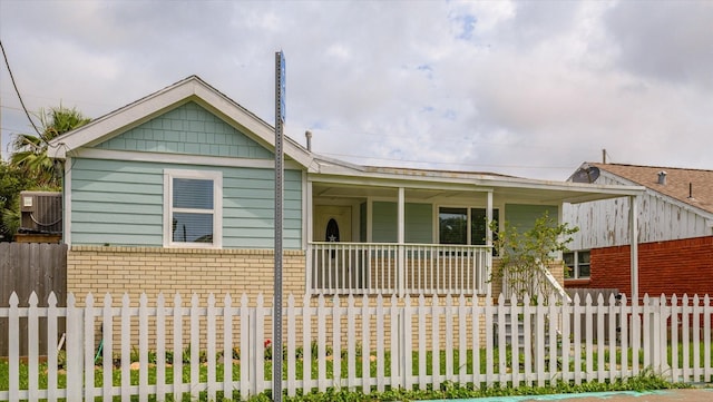 3518 Ball, Galveston, TX 77550 - view of front of home featuring a porch and central AC