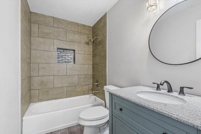 3518 Ball, Galveston, TX 77550 - full bath featuring toilet, shower / bathtub combination, vanity, and wood finished floors