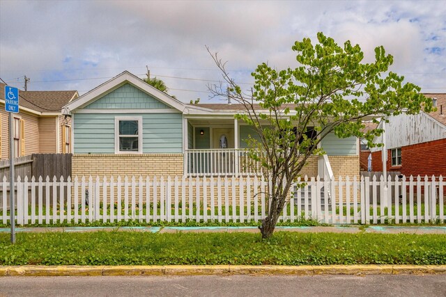 3518 Ball, Galveston, TX 77550 - view of front of home featuring a fenced front yard and covered porch