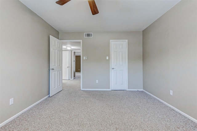 13060 Trail Hollow Dr Unit 3060, Houston, TX 77079 - unfurnished bedroom featuring baseboards, carpet, and a ceiling fan