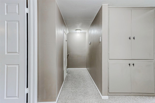 13060 Trail Hollow Dr Unit 3060, Houston, TX 77079 - corridor with baseboards and carpet flooring