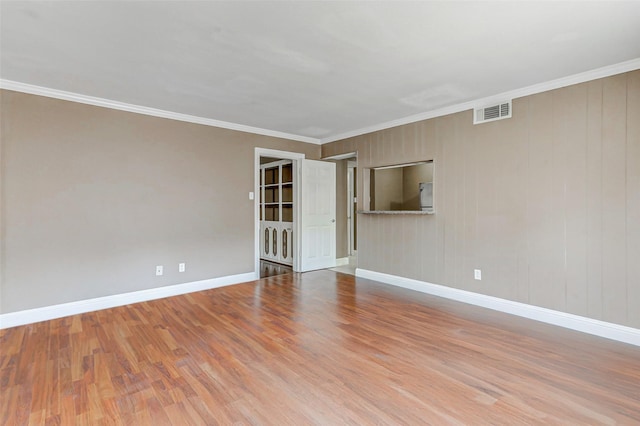 13060 Trail Hollow Dr Unit 3060, Houston, TX 77079 - unfurnished room with wood finished floors, baseboards, and ornamental molding