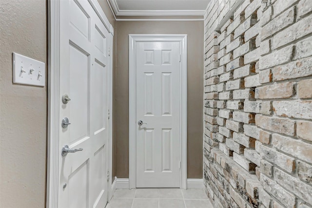 13060 Trail Hollow Dr Unit 3060, Houston, TX 77079 - doorway with light tile patterned floors and ornamental molding