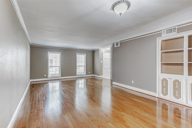 13060 Trail Hollow Dr Unit 3060, Houston, TX 77079 - unfurnished room with ornamental molding, baseboards, and wood-type flooring