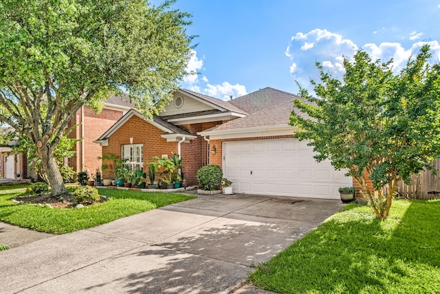 view of front facade with a garage, driveway, brick siding, a front lawn, and roof with shingles