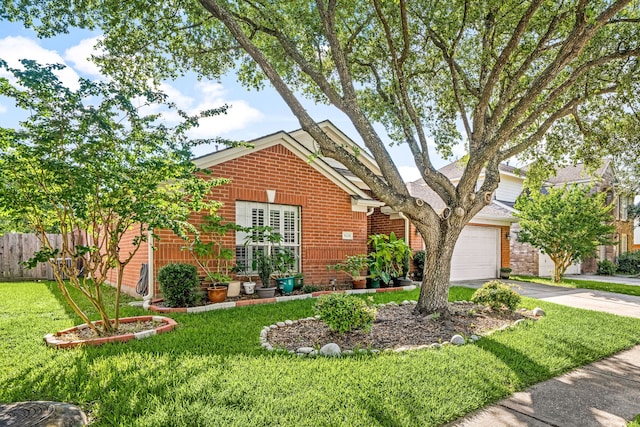 view of front of house with brick siding, driveway, and an attached garage