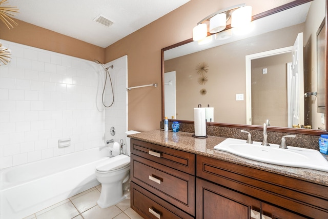 bathroom with toilet, tile patterned flooring, bathtub / shower combination, and vanity