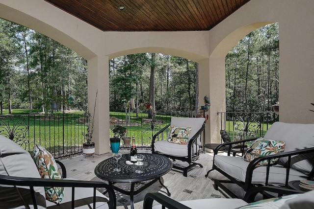280 Sundog Rd, Huntsville, TX 77340 - view of patio featuring outdoor lounge area and view of wooded area