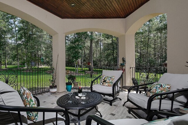 280 Sundog Rd, Huntsville, TX 77340 - view of patio with an outdoor living space and view of scattered trees