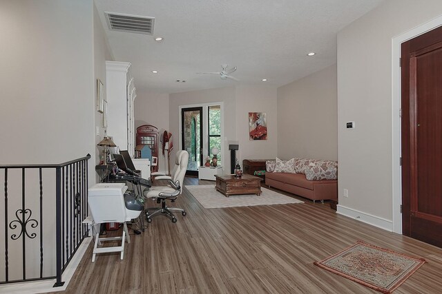 280 Sundog Rd, Huntsville, TX 77340 - office featuring wood finished floors, a ceiling fan, recessed lighting, and baseboards