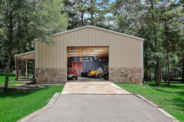 280 Sundog Rd, Huntsville, TX 77340 - view of outdoor structure with driveway