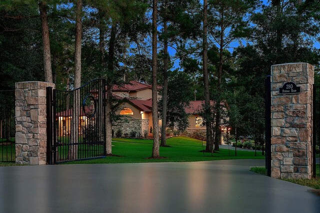 280 Sundog Rd, Huntsville, TX 77340 - gate with a lawn