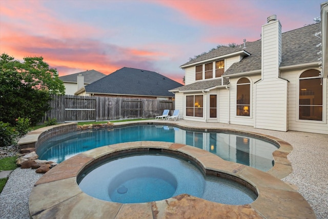 17815 Fairgrove Park Dr, Houston, TX 77095 - view of pool with a fenced backyard and a pool with connected hot tub