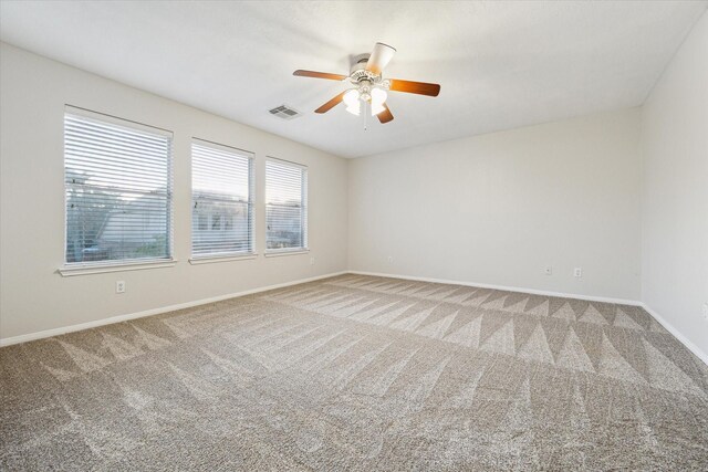 17815 Fairgrove Park Dr, Houston, TX 77095 - spare room featuring carpet, a ceiling fan, and baseboards