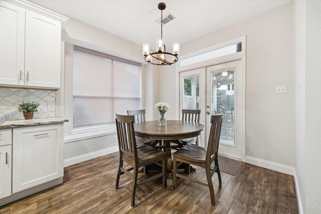 17815 Fairgrove Park Dr, Houston, TX 77095 - dining area featuring baseboards, a chandelier, dark wood-style floors, and french doors