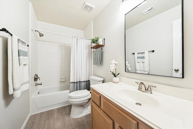 17815 Fairgrove Park Dr, Houston, TX 77095 - bathroom with wood finished floors, toilet, vanity, shower / bathtub combination with curtain, and baseboards