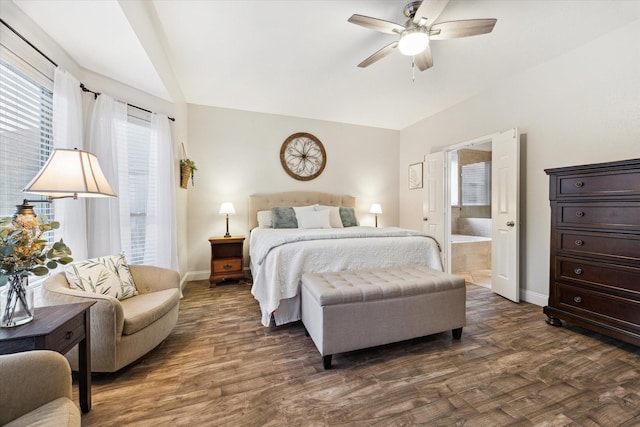 17815 Fairgrove Park Dr, Houston, TX 77095 - bedroom with vaulted ceiling, dark wood finished floors, baseboards, ensuite bath, and a ceiling fan