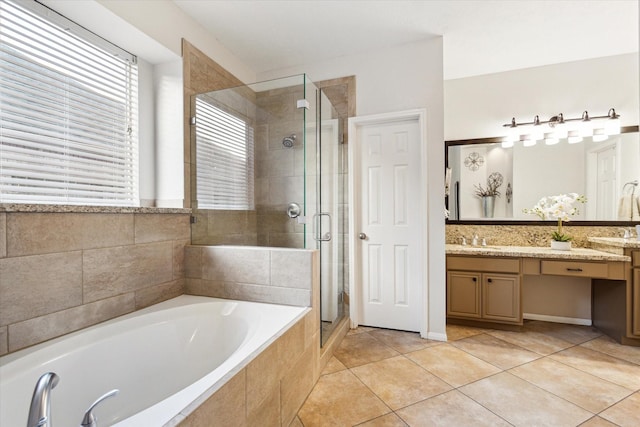 17815 Fairgrove Park Dr, Houston, TX 77095 - full bath with a garden tub, tile patterned flooring, vanity, a stall shower, and plenty of natural light