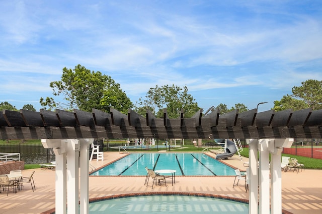 17815 Fairgrove Park Dr, Houston, TX 77095 - community pool featuring a patio area, fence, and a pergola