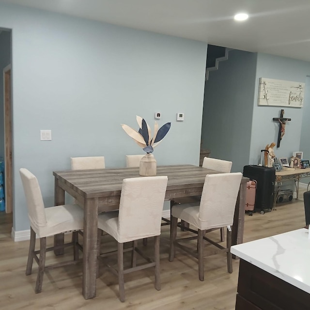 16514 Green Manor Dr, Humble, TX 77396 - dining area featuring light wood-type flooring and recessed lighting
