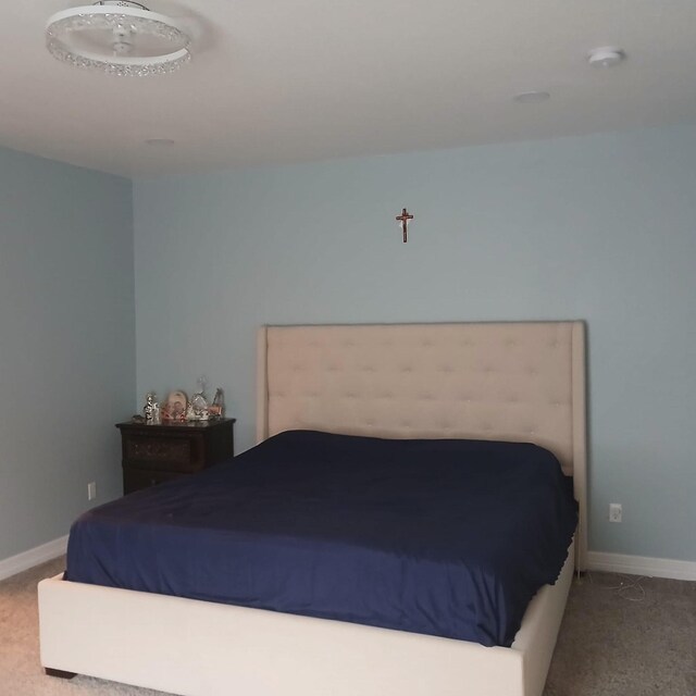 16514 Green Manor Dr, Humble, TX 77396 - bedroom featuring carpet flooring and baseboards