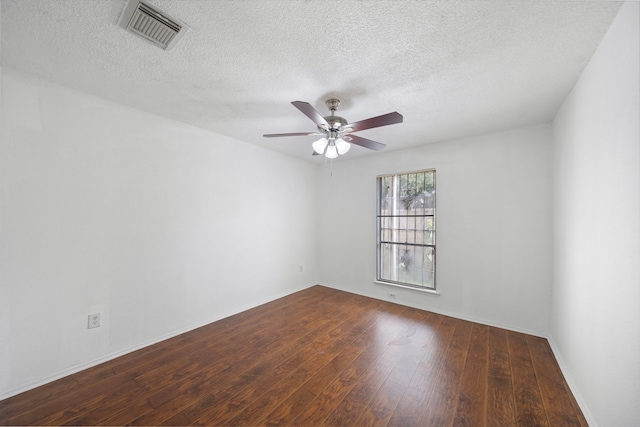 9537 Pagewood Ln Unit 9537, Houston, TX 77063 - spare room featuring wood finished floors, ceiling fan, a textured ceiling, and baseboards