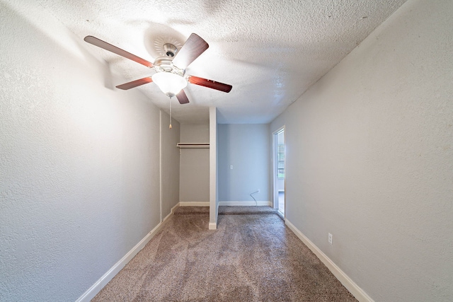 1502 Stevenage Ln, Channelview, TX 77530 - unfurnished bedroom featuring carpet flooring, a textured wall, a textured ceiling, baseboards, and a closet