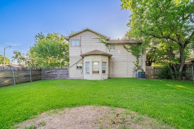 1502 Stevenage Ln, Channelview, TX 77530 - rear view of property with brick siding and cooling unit