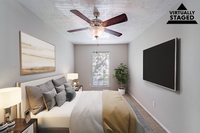1502 Stevenage Ln, Channelview, TX 77530 - carpeted bedroom with a textured ceiling, a ceiling fan, and baseboards