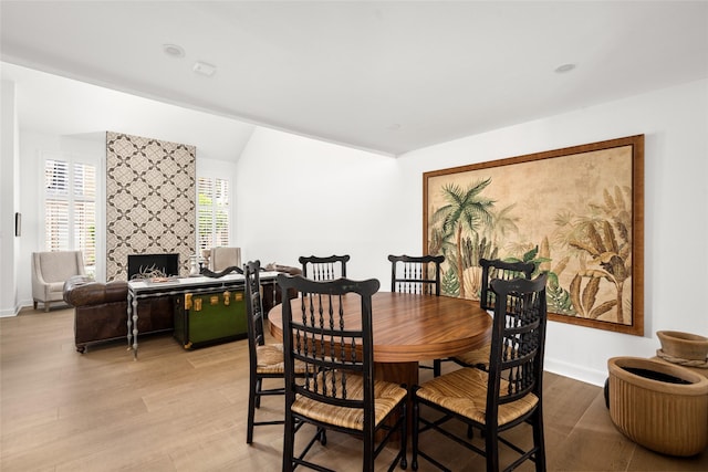2421 Potomac Dr Unit C, Houston, TX 77057 - dining area featuring light wood finished floors and baseboards