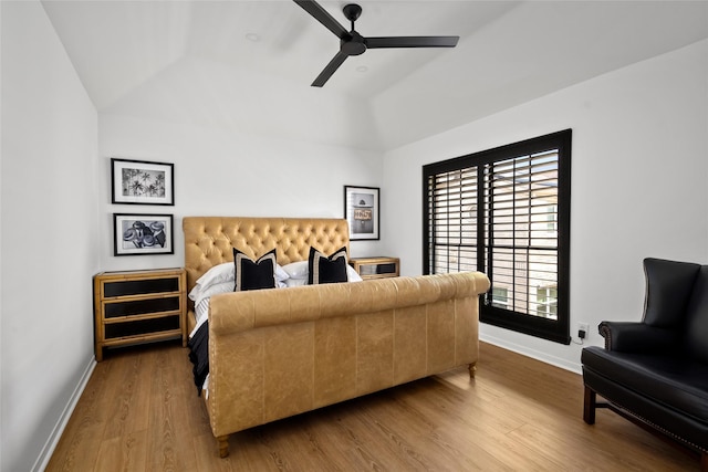2421 Potomac Dr Unit C, Houston, TX 77057 - bedroom with wood finished floors, baseboards, vaulted ceiling, and ceiling fan