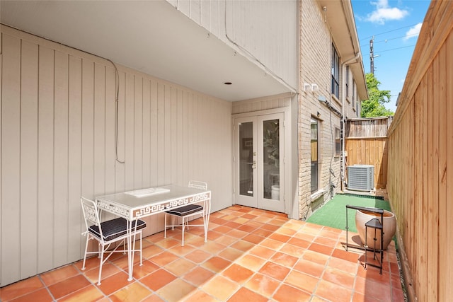 2421 Potomac Dr Unit C, Houston, TX 77057 - view of patio / terrace with french doors, fence, and cooling unit