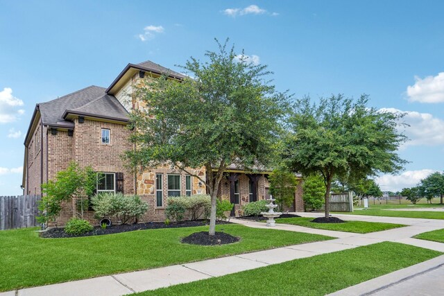 3115 Hillside Landing Trl, Katy, TX 77494 - view of property hidden behind natural elements with brick siding