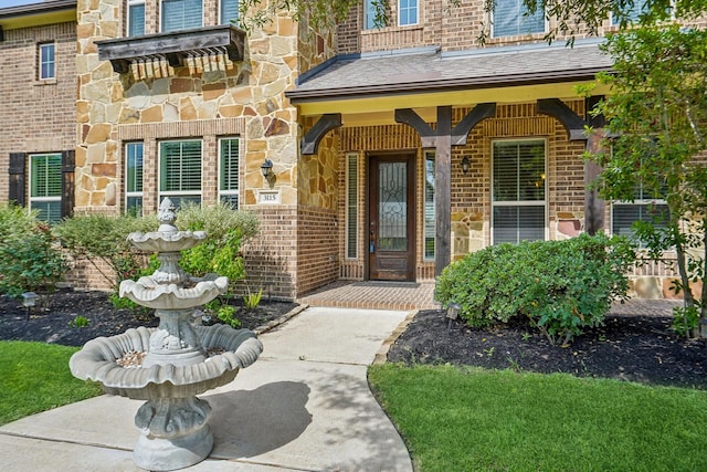 3115 Hillside Landing Trl, Katy, TX 77494 - entrance to property with stone siding, brick siding, and covered porch