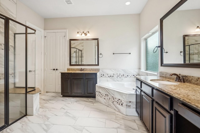 3115 Hillside Landing Trl, Katy, TX 77494 - bathroom featuring a stall shower, a bath, marble look tile flooring, and two vanities