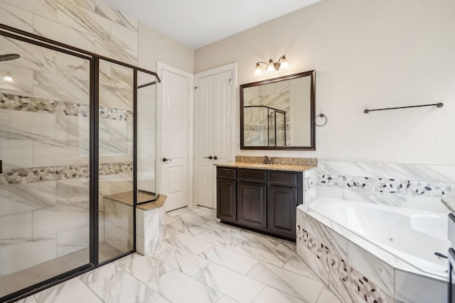 3115 Hillside Landing Trl, Katy, TX 77494 - bathroom with a stall shower, a jetted tub, vanity, and marble finish floors