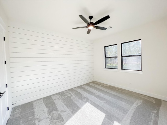 21332 Monarch Dr, Montgomery, TX 77316 - unfurnished room with light carpet, a ceiling fan, and baseboards