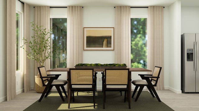 3035 Ruby Ridge Dr, Katy, TX 77493 - dining room featuring light wood-type flooring and baseboards