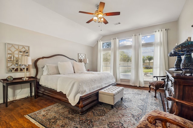 2850 Woodland Glen Ln, Conroe, TX 77385 - bedroom with wood finished floors, vaulted ceiling, ceiling fan, and baseboards